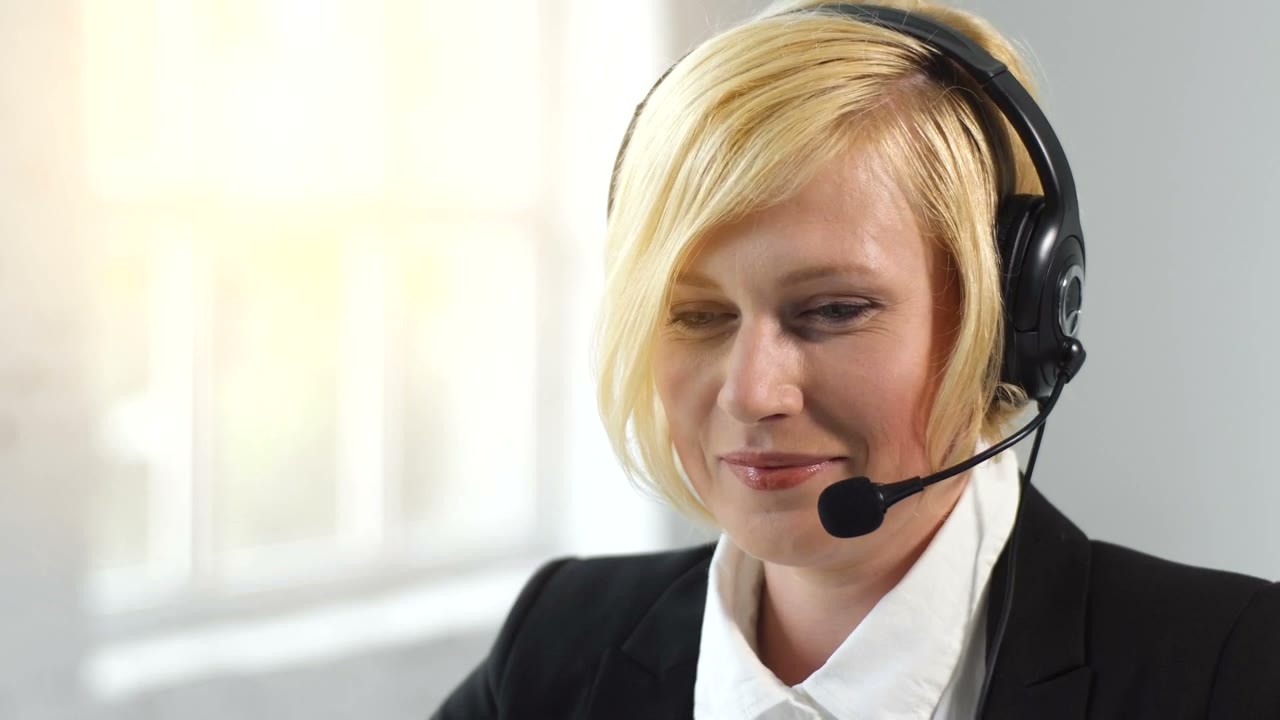 Patient coordinator on a headset call