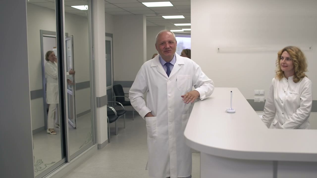Clinic staff gathered at a practice reception desk